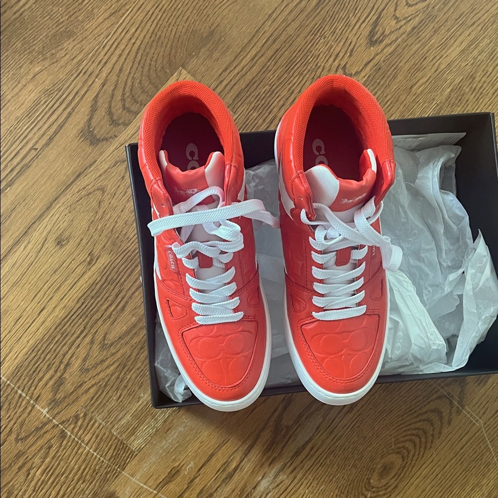 Men’s 7.5 Coach Orange & White High Top Fashion Sneakers (fits woman size 9 too)